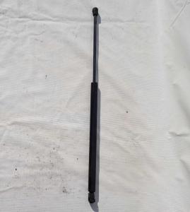 Амортизатор двери багажника левый Chevrolet Tahoe 1999-2006 15766375; 15746119