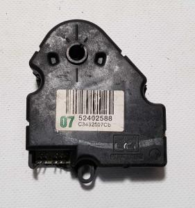 Моторчик заслонки отопителя правый Chevrolet (General Motors) 52402588; 89018365; 16163982